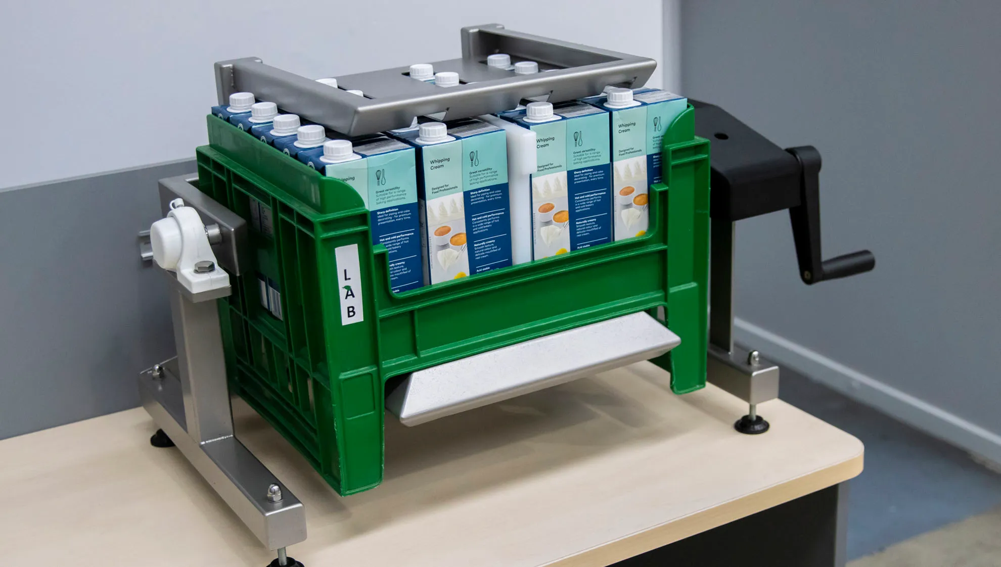 Carton Inverter from Motion Design Automation, for inverting liquids before sampling. 
