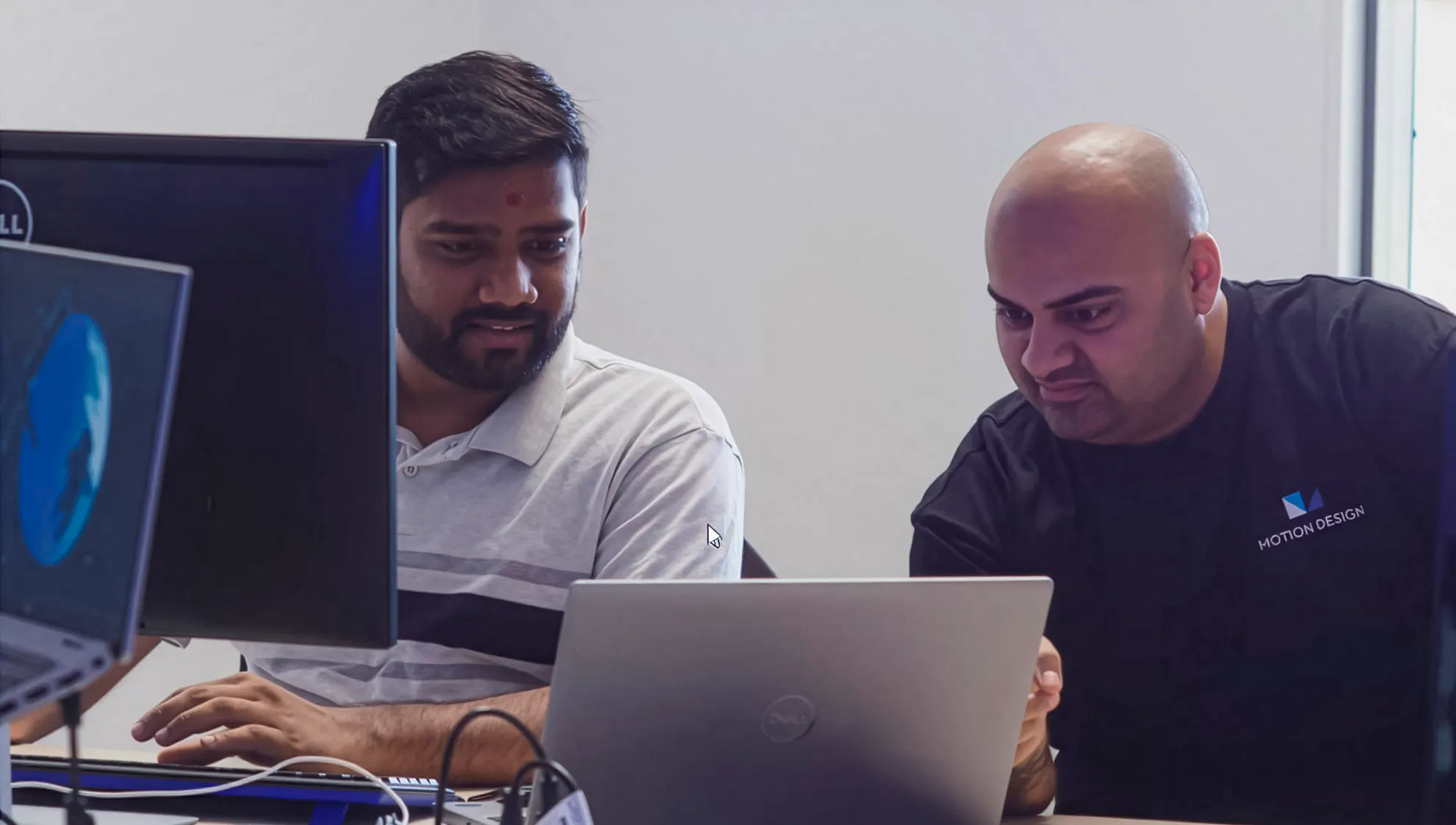 Software team working on a custom project to streamline their business.